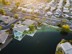 Aerial view of a private coastal estate among low-density waterfront residences, illustrating the scarce prime land supply driving India real estate appreciation